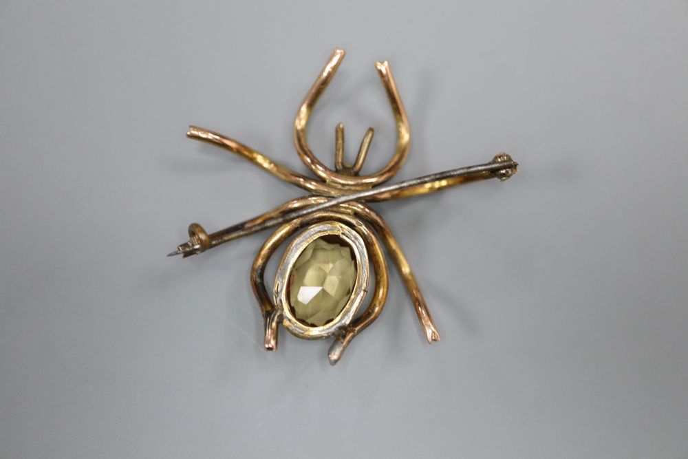 A yellow metal, citrine and split pearl set spider brooch, 36mm, gross 8.4 grams.